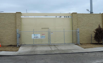 IES-2000 designed, engineered and installed the solution: a gate system that met ALL requirements for security, wind control and noise suppression.